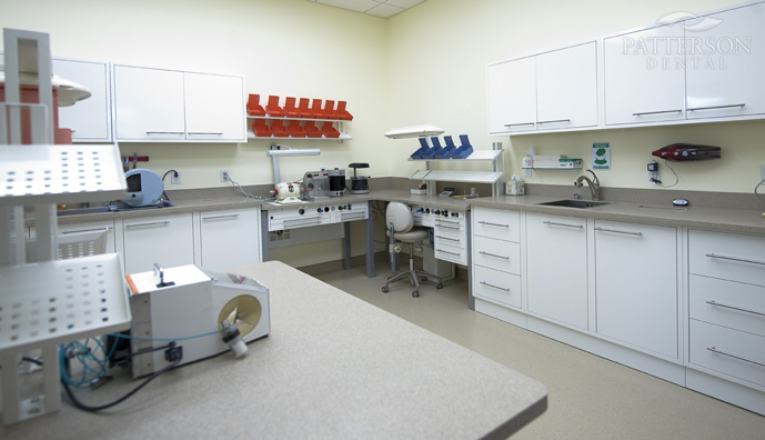 The office is moving in the direction of a full-scale lab, with four ergonomically designed Dental-Arte workstations furnished with vacuums and electric handpieces.
