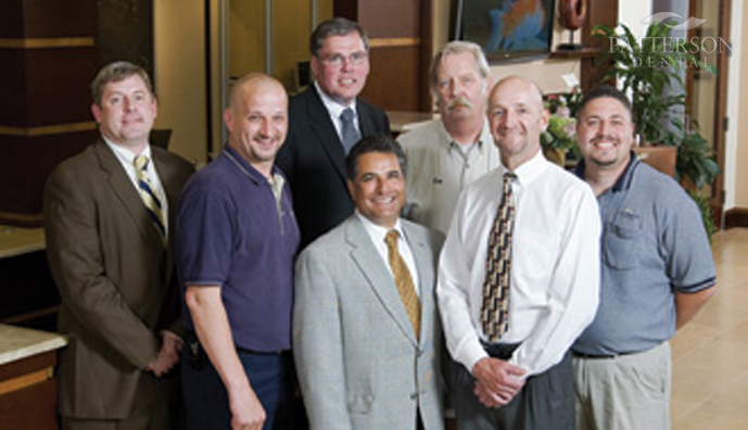 From left to right: Rex Plamann, Doug Filomena, Michael Gaurke, Jim Plescia, Ken Werderits, Dr. Dennis Collins and John Saltijeral.